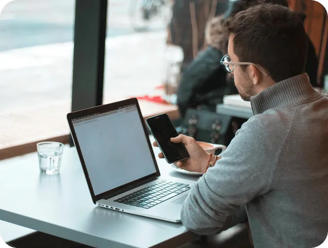 Professional using Xolara AI platform to automate support workloads